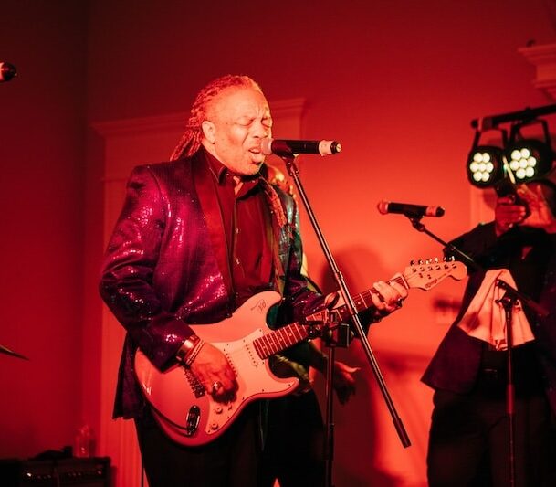 How Do Live Bands Adapt Their Style to Different Musical Genres